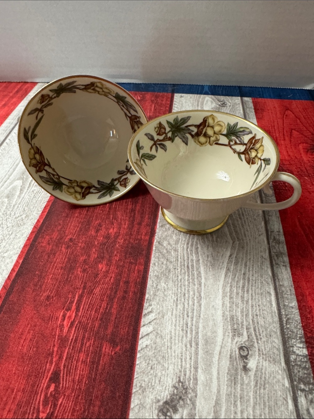 Cream Floral Porcelain Teacup and Saucer Set with Gold Trim